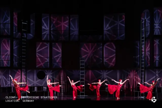 A world suspended between darkness and dawn.
 
For Bayerische Staatsoper’s production of Die Nacht vor Weihnachten, Big Image crafted multiple hanging visual elements, all printed on Rolltex.
 
The scenic environment evolves through the interplay of fabric, light, and scenography – creating depth, atmosphere, and emotional impact on stage.
 
From imagination to installation.
 
Director: Barrie Kosky
Stage Designer: Klaus Grünberg
Costume Designer: Klaus Bruns
.
.
.
.
.
.
setdesign, setdesigner, scenography, scenicdesign, scenicdesigner, lightdesign, lightdesigner, productiondesign, productiondesigner
 
#143654